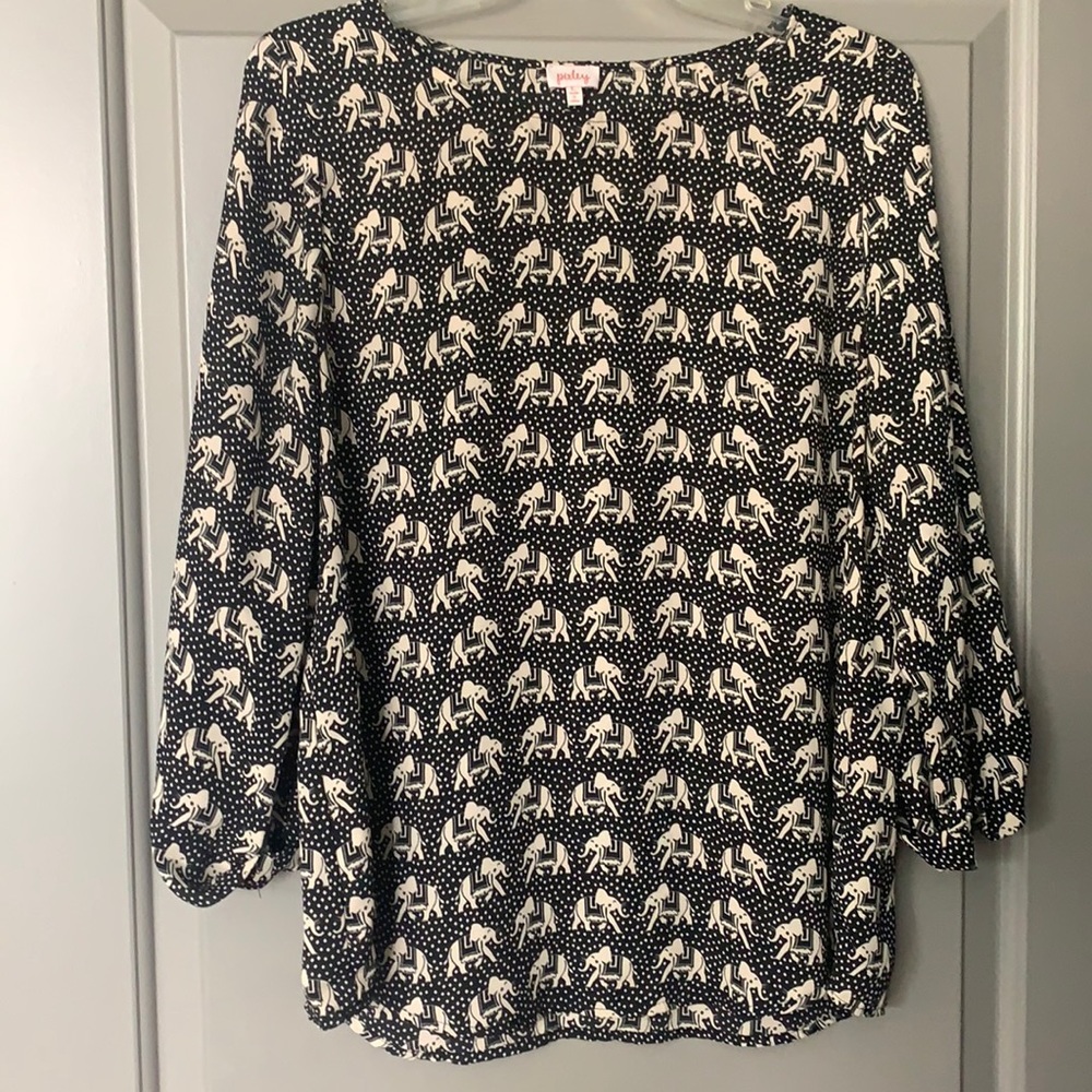 Polyester 3/4 length sleeve. Elephant print